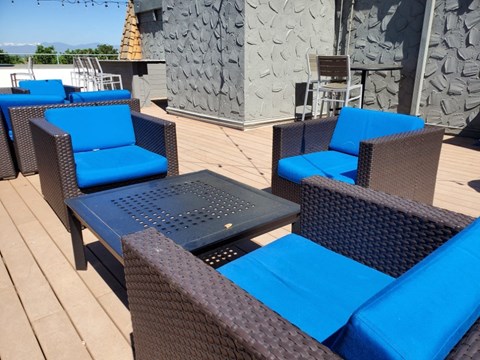Relax and mingle while enjoying fresh air on the rooftop deck at 136 S Penn in Denver, CO