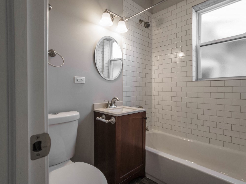 Gorgeous bathroom with subway tiled shower