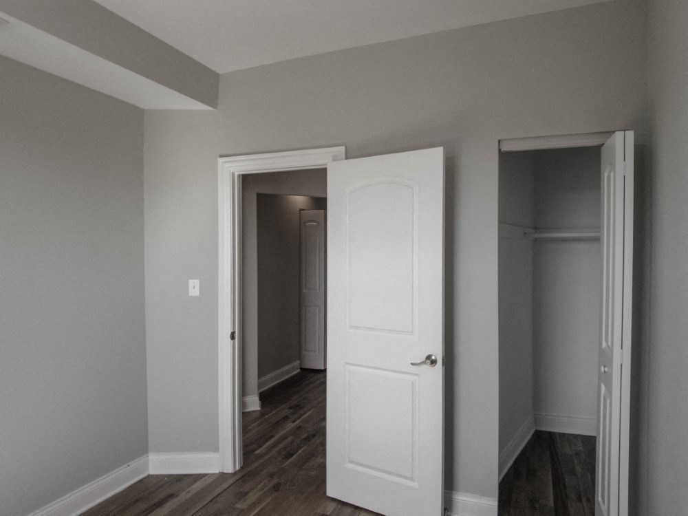 Bedroom one closet and entry