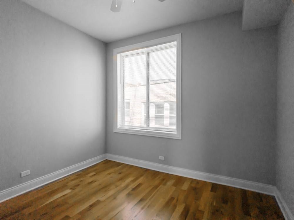 Third bedroom with ceiling fan