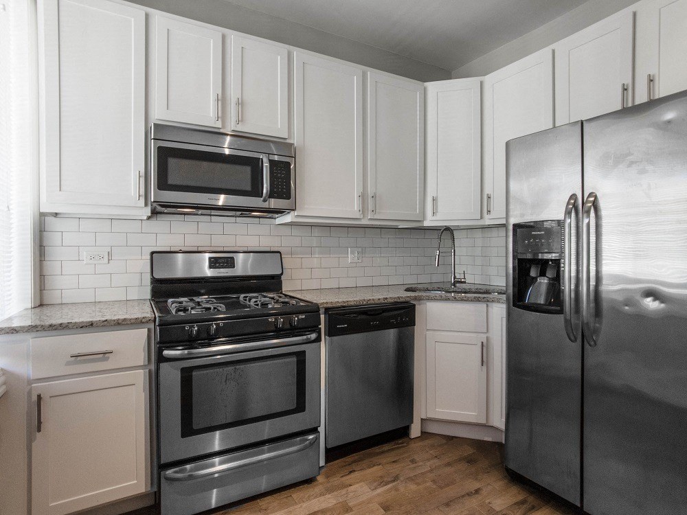 Kitchen with subway tiled backsplash