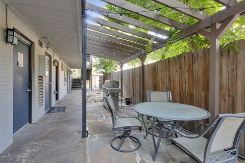 Outdoor Community Patio with Seating at 1443 Elizabeth in Denver, CO