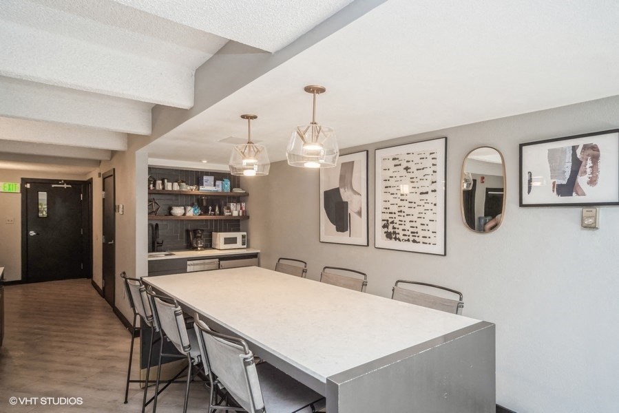 Meeting area with plenty of seating and coffee bar at 878 S Dexter St in Denver, CO