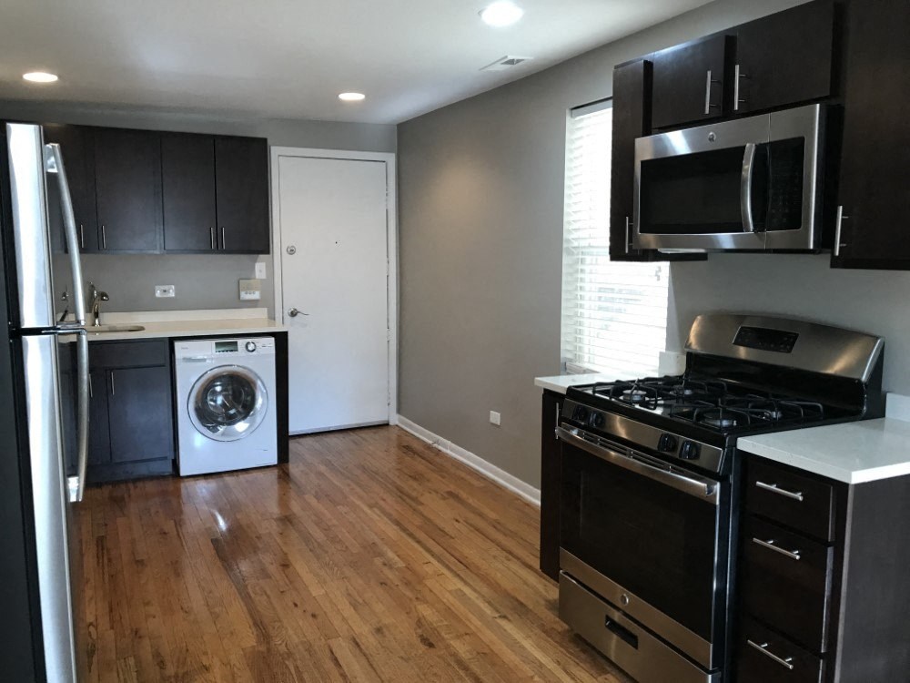 Stainless steel appliances with a built in microwave