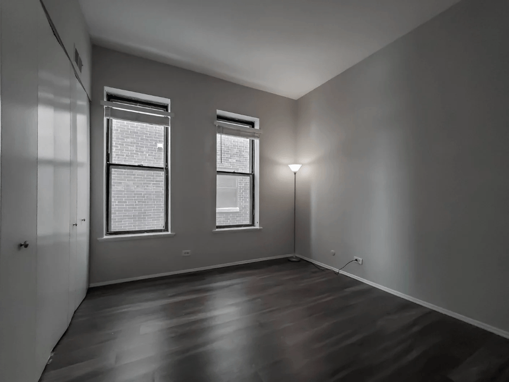 Grey Bedroom with Plenty of Closet Space