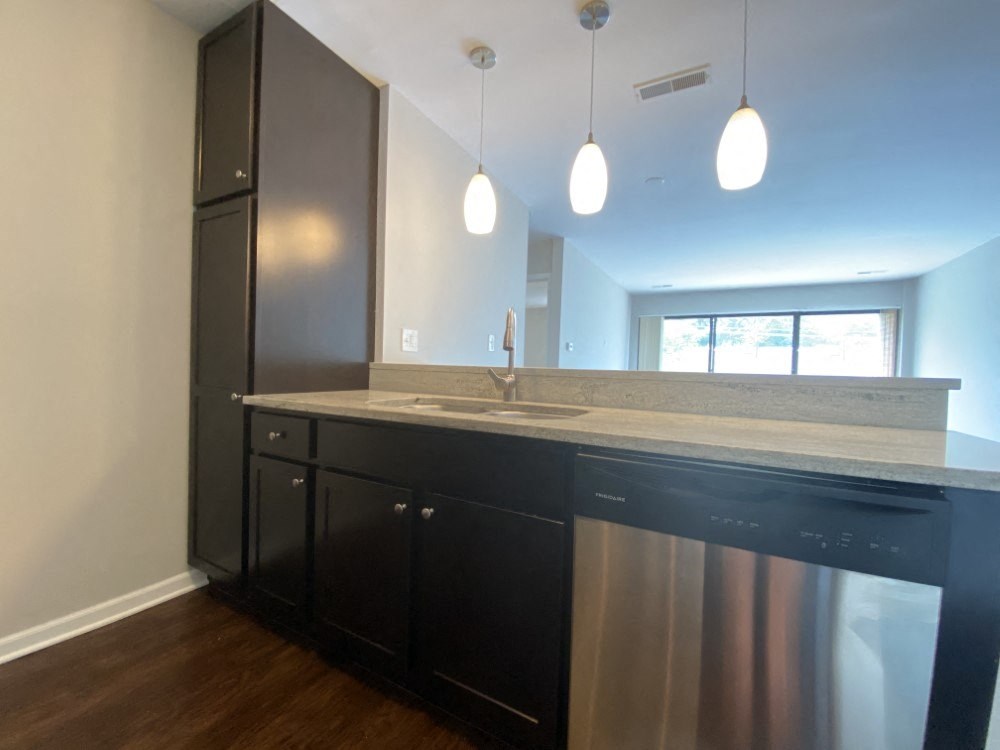 Open concept layout with large food pantry in the kitchen