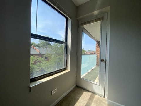 Door to the balcony from the bedroom