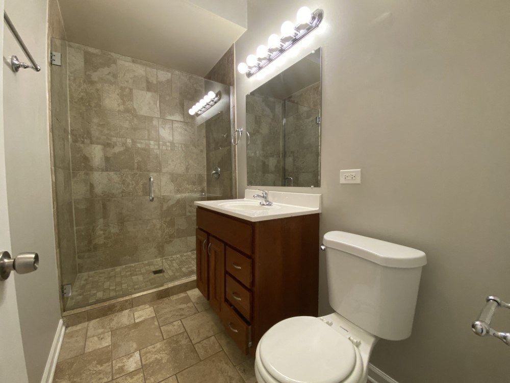 Bathroom with nice glass shower and vanity storage - 2 Bedroom