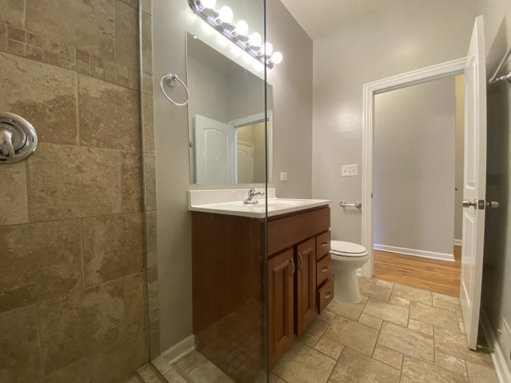 Bathroom with nice glass shower and vanity storage - 2 Bedroom