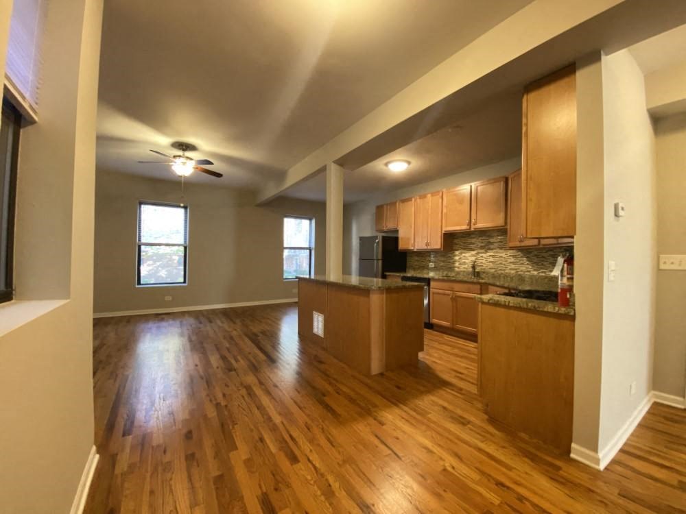 Open and airy living area with a ceiling fan - 3 Bedroom 2 Bath