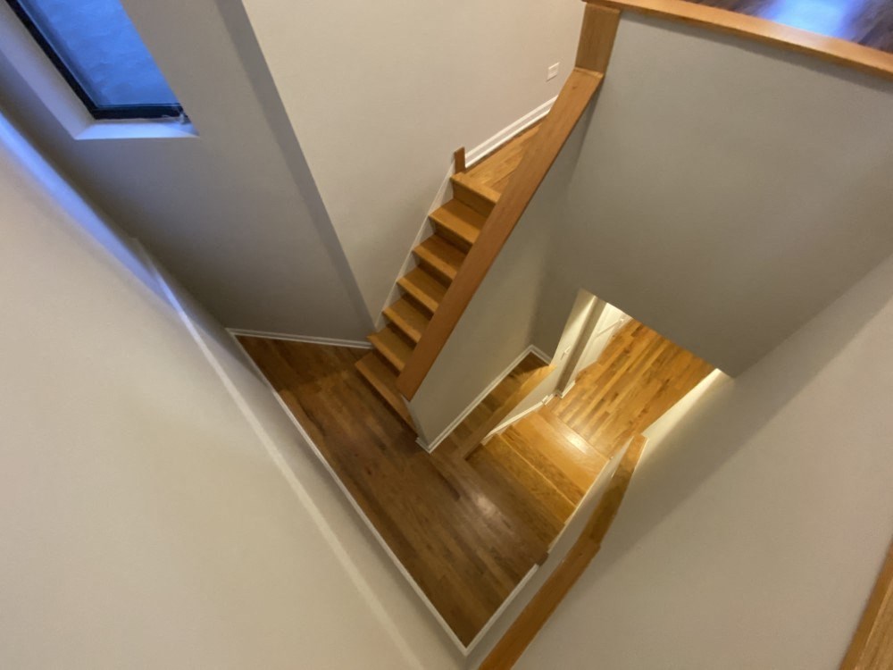 Staircase looking down to bottom floor - 3 Bedroom 2 Bath