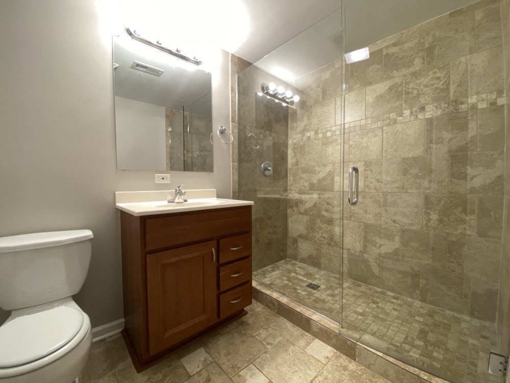 Gorgeous tiled shower with glass shower doors - 3 Bedroom 2 Bath