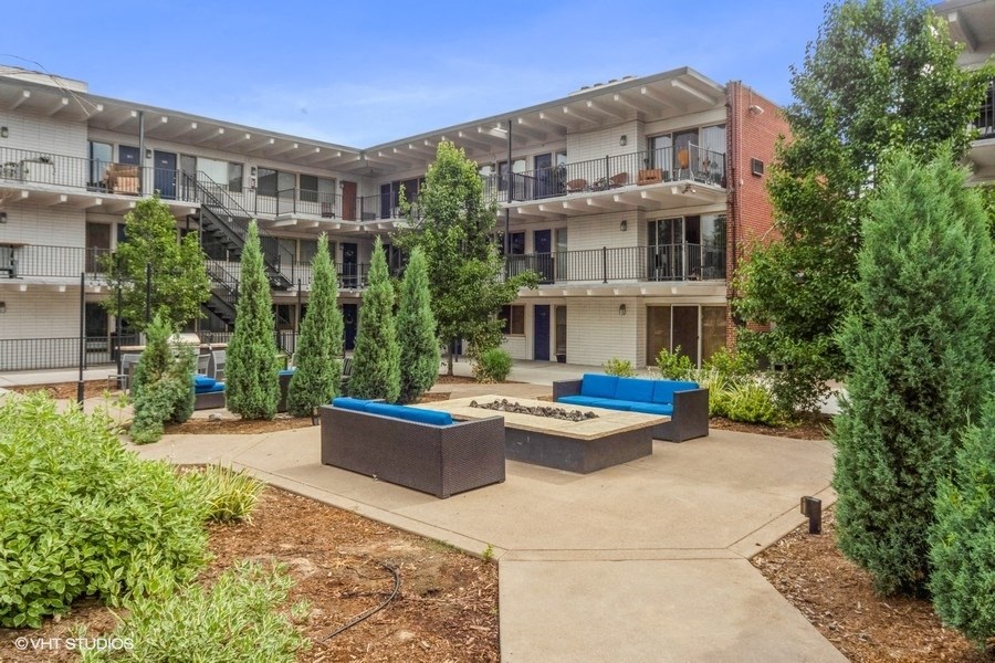Outdoor fire pit with comfortable couch seating