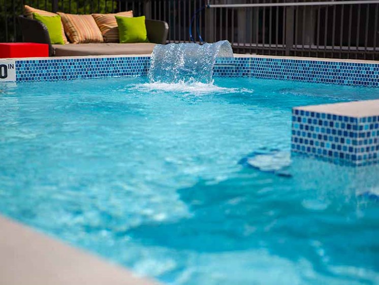 Waterfall attached to the luxury pool
