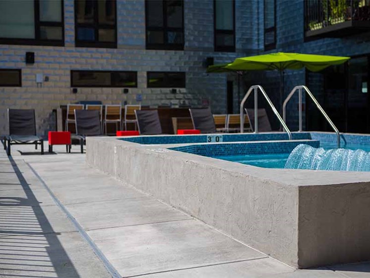 Pool surrounded by lounge chairs