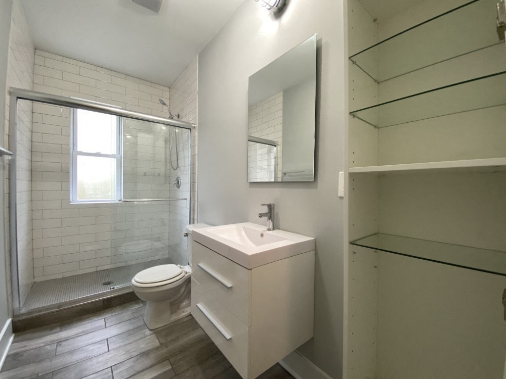 Updated bathroom with a step in shower with glass doors - 2 Bedroom