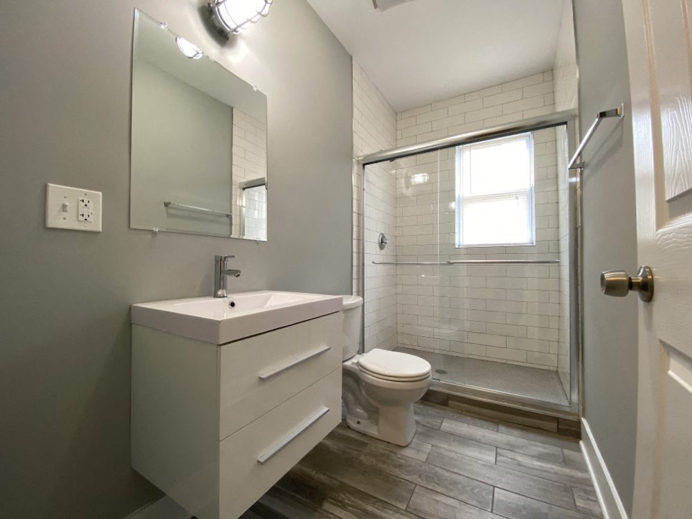 Updated Bathroom with a tiled shower with glass door - 3 Bedroom