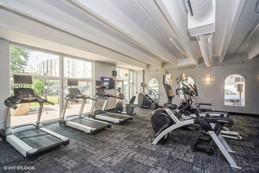 Cardio equipment available in the fitness center at 878 S Dexter St in Denver, CO