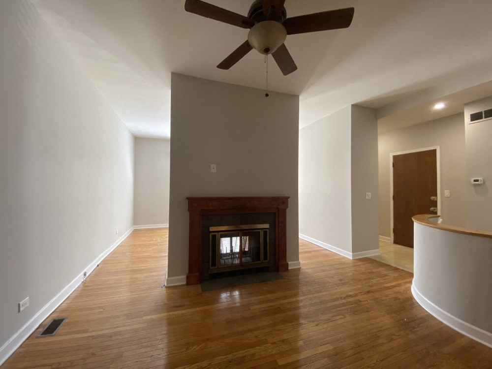 Open living space with ceiling fan