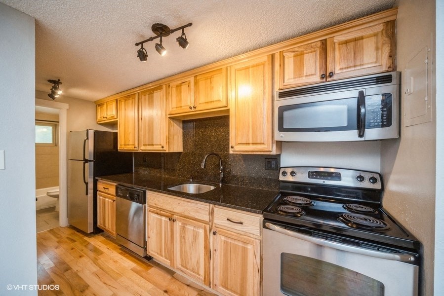 Stainless steel appliances with a built in microwave at 23–33 Pearl St in Denver, CO