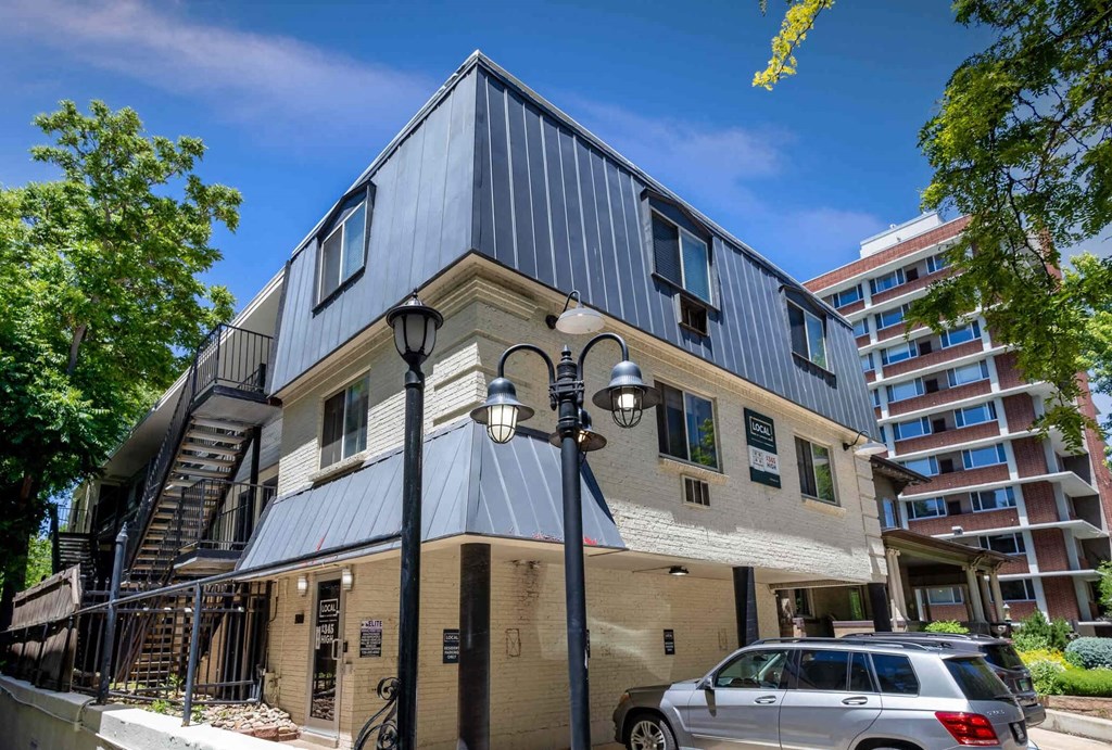 a building with a car parked in front of it