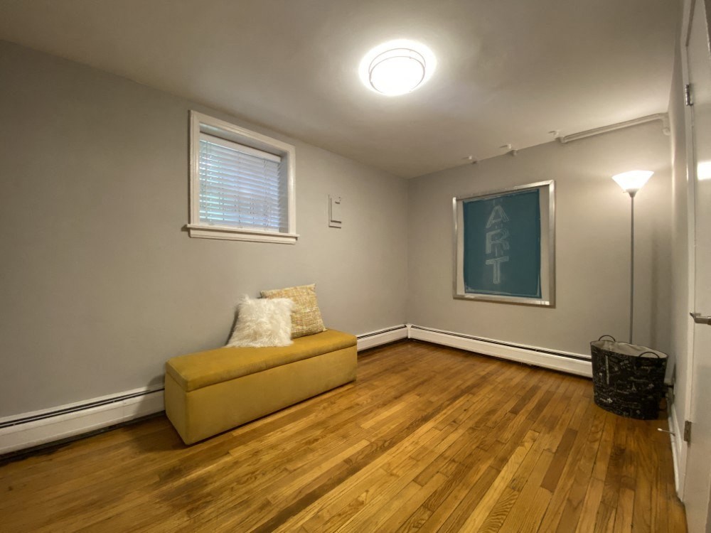 Bedroom with hardwood floors