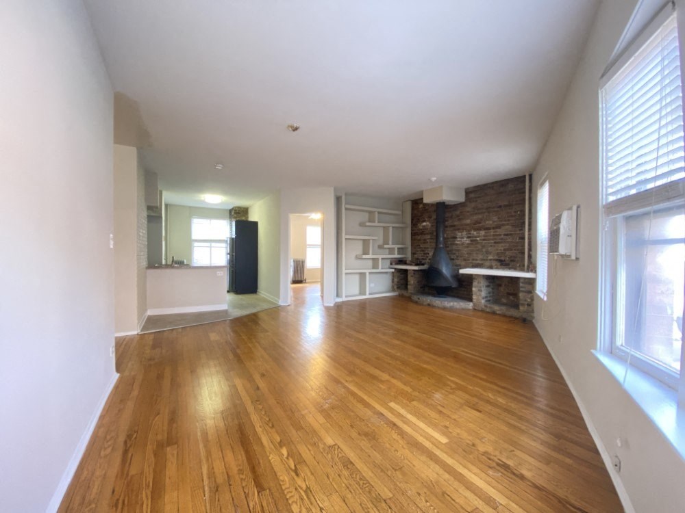 Spacious living room with hardwood floors - 2 Bedroom B
