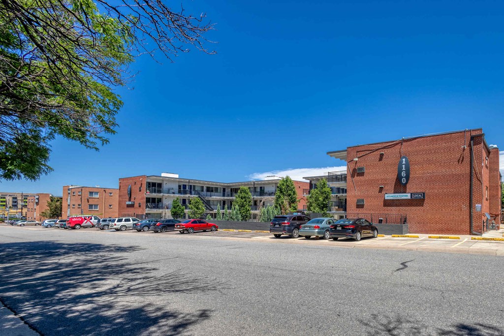 a view of a parking lot in front of a building