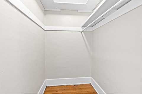 Spacious walk-in closet with built-in shelving 1170 N Logan St in Denver, CO
