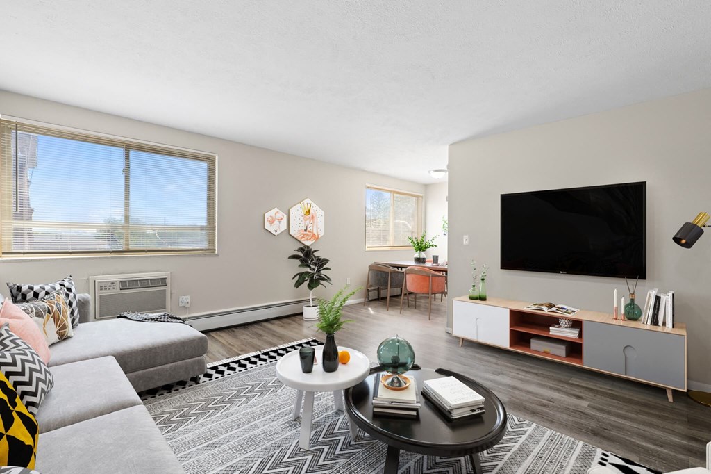 a living room with a couch and a tv