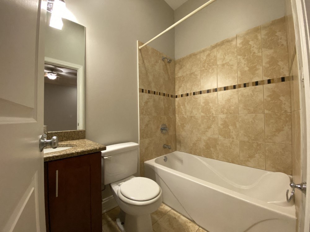 Upgraded bathroom with tiled full tub - 3 Bedroom