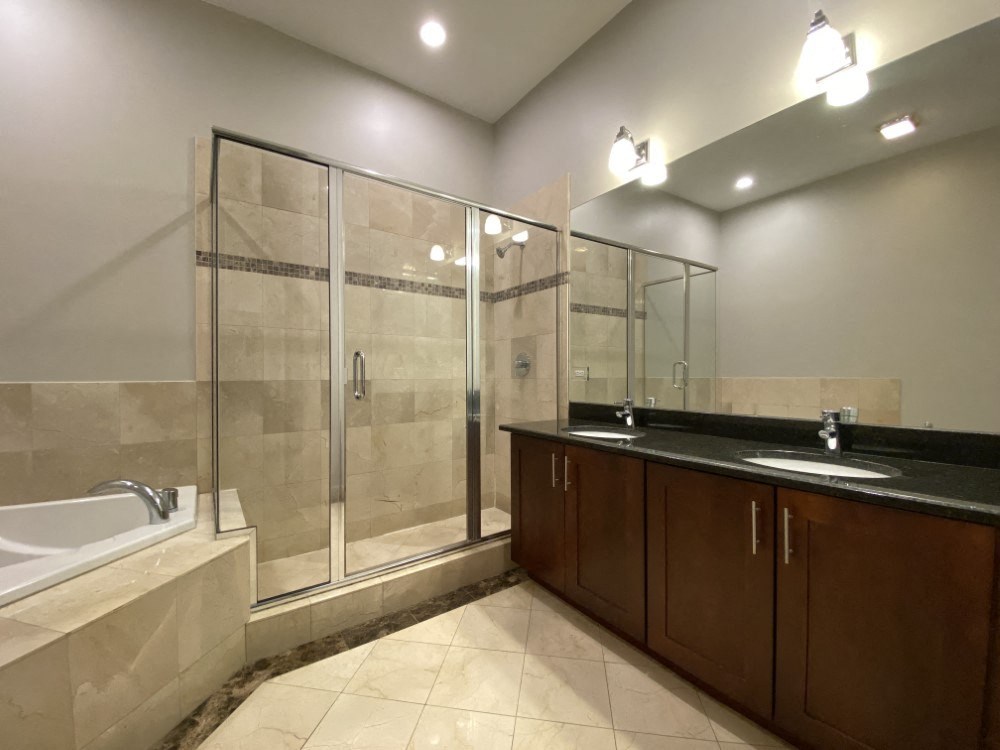 Bathroom with dual sinks, garden tub and walk-in shower - 3 Bedroom