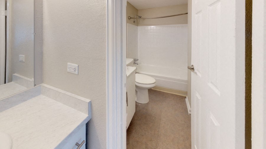 All- white bathroom  at 4805 E Kentucky in Denver, CO