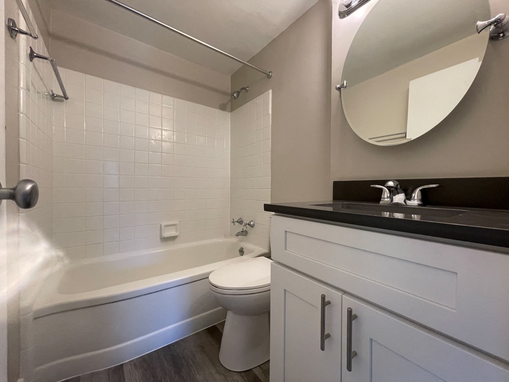 Updated bathroom with a tiled shower - Large 2 Bedroom  at 5550 S Dorchester, Chicago, IL