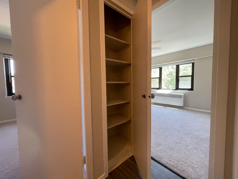 Linen closet in the hallway between bedrooms - Large 2 Bedroom  at 5550 S Dorchester, Chicago, IL, 60637