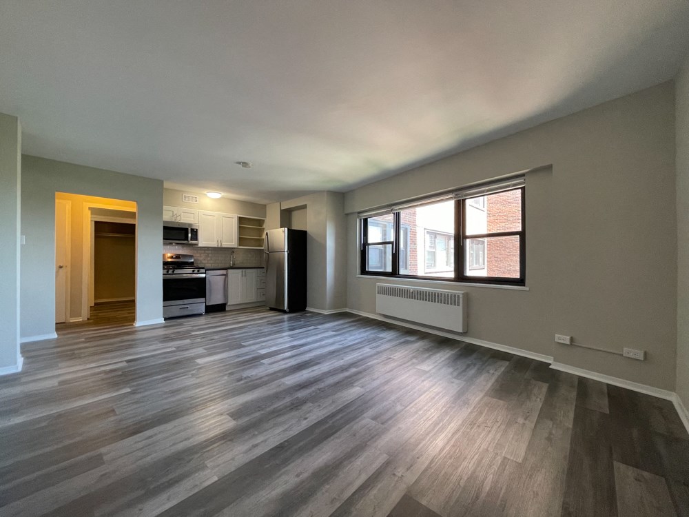 Spacious open living area with beautiful flooring - Studio  at 5550 S Dorchester, Chicago, Illinois
