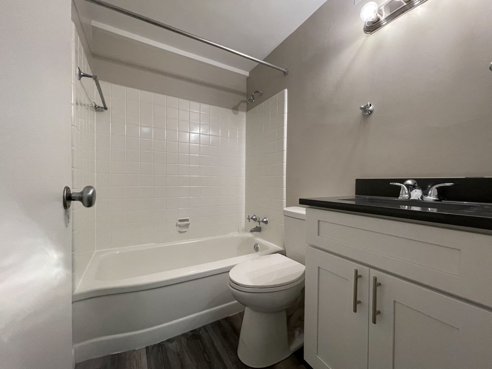 Bright bathroom with vanity storage - Studio  at 5550 S Dorchester, Chicago