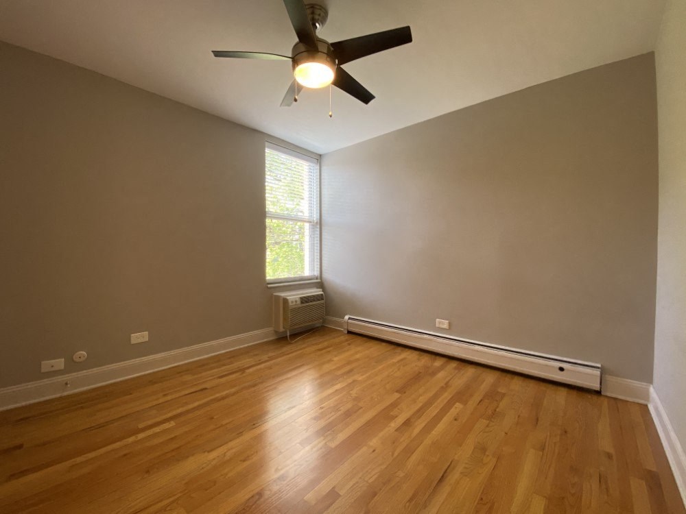 Bedroom with a ceiling fan - Two Bedroom