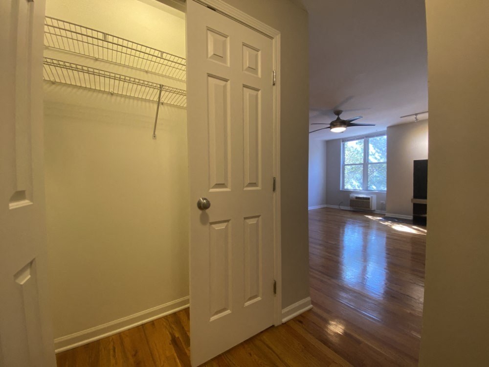 Coat closet by the front entry - Large One Bedroom