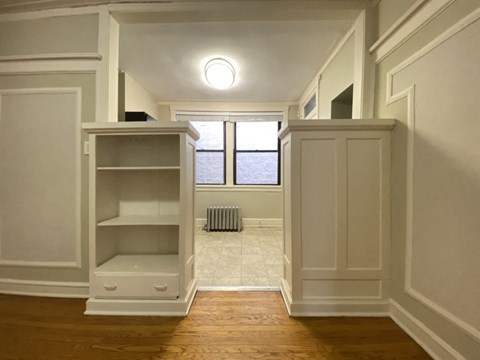 Built in shelving and chic wall molding