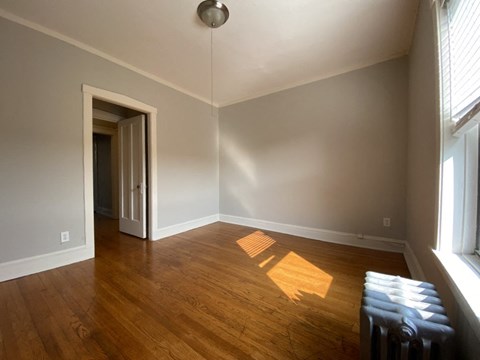 Bedroom with hardwood floors