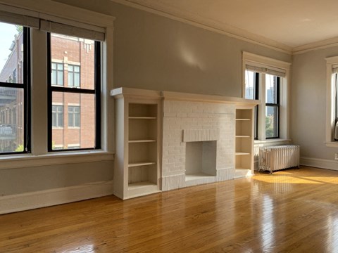 Brick mantel with bookshelf storage