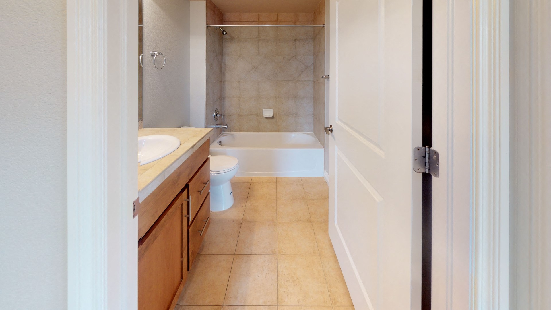 Full bathroom including a tub