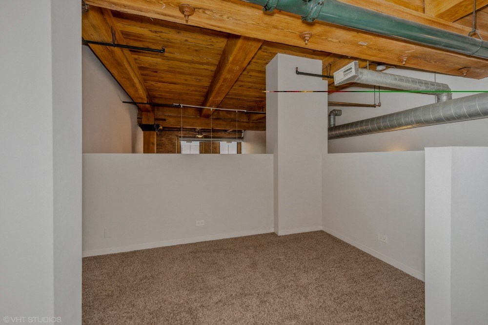 Loft bedroom at Carriage House Lofts, Illinois
