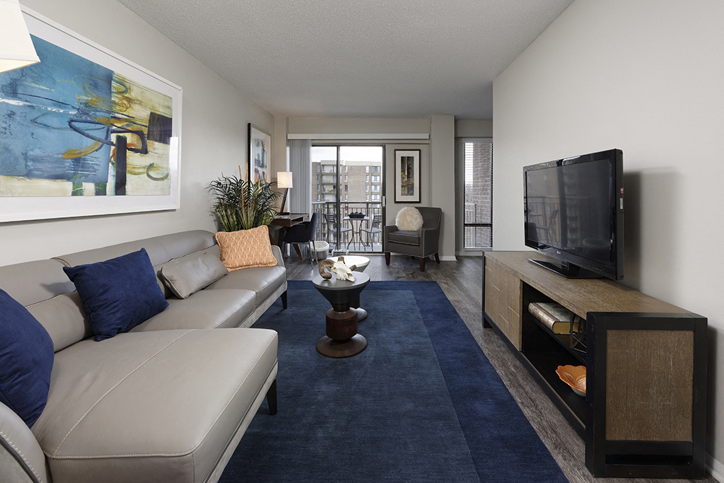 a living room with a couch and a tv