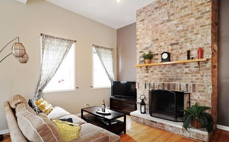 Exposed Brick Fireplace