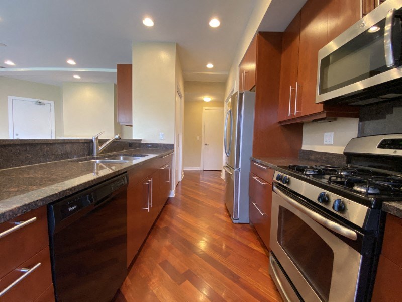 Bright kitchen with granite countertops
