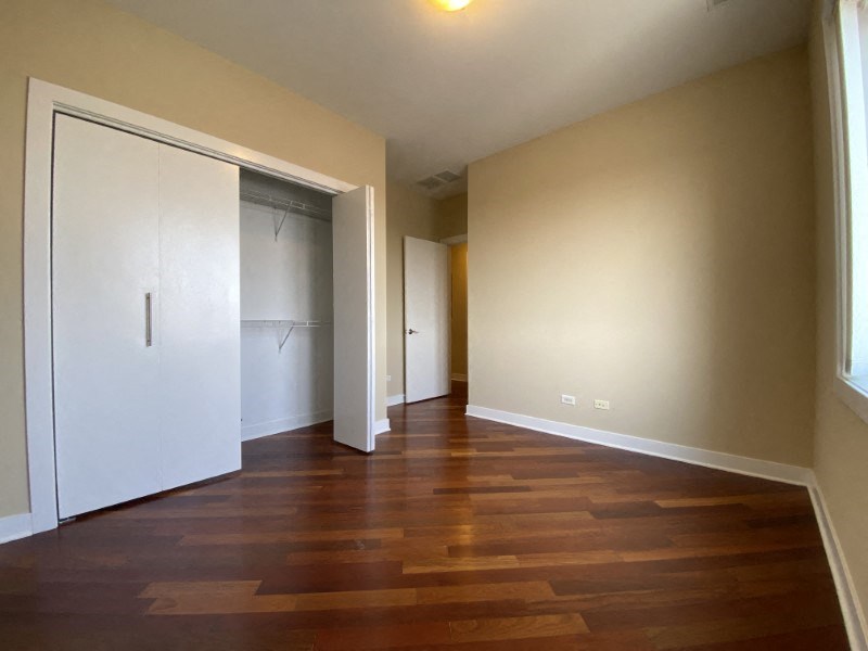 Bedroom with large closets