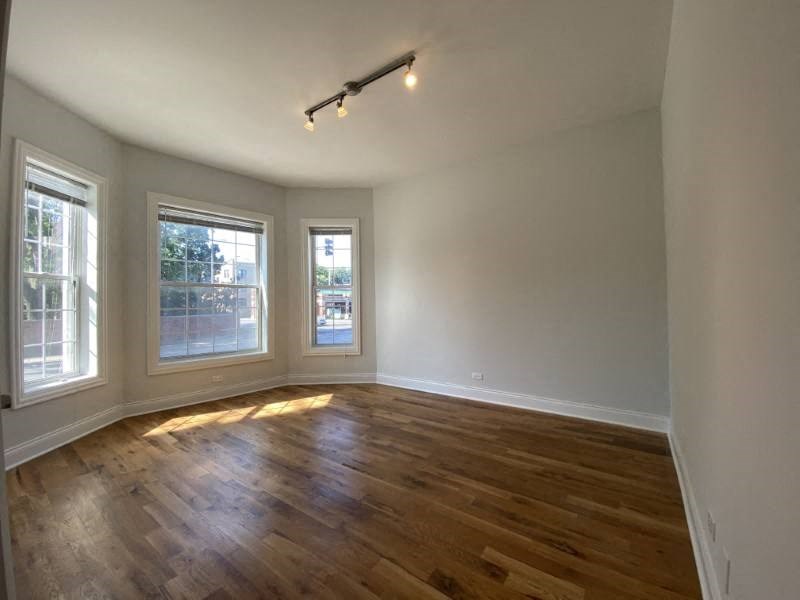 Stunning hardwood floors and large windows