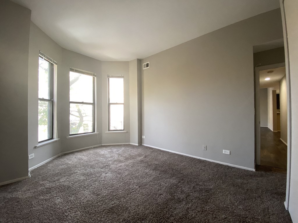 Bedroom with lots of natural lighting